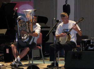 Traditionally at the last day Jamey takes out his banjo. He should stick to his day job...